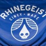 Blue Rhinegeist Brewery logo banner hanging on wall