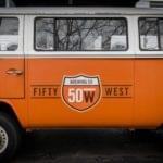 Orange vintage van with brewery logo