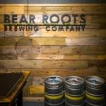 Bear Roots Brewing Company taproom interior with barrels