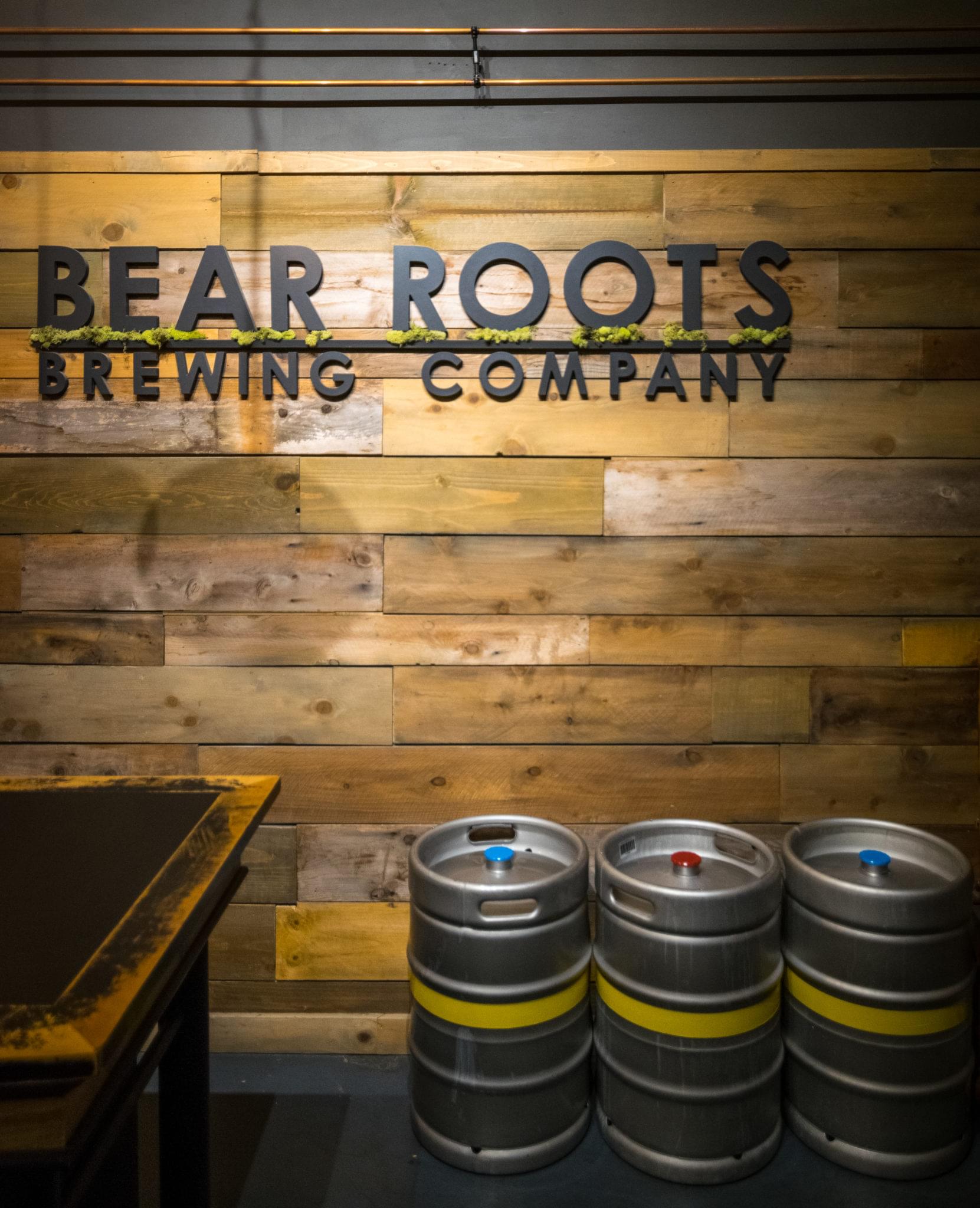 Bear Roots Brewing Company taproom interior with barrels