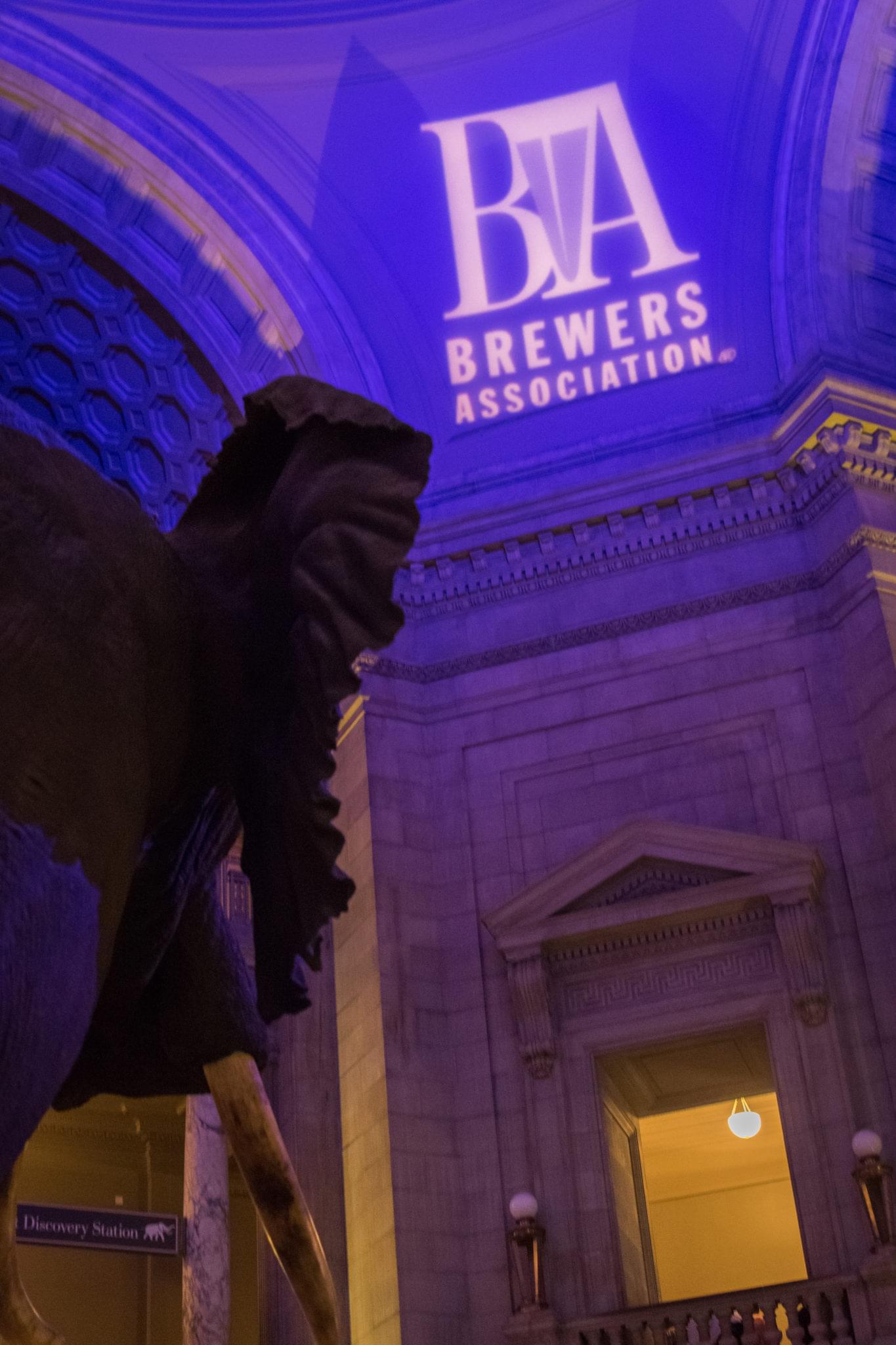 Brewery entrance illuminated with blue lighting at night