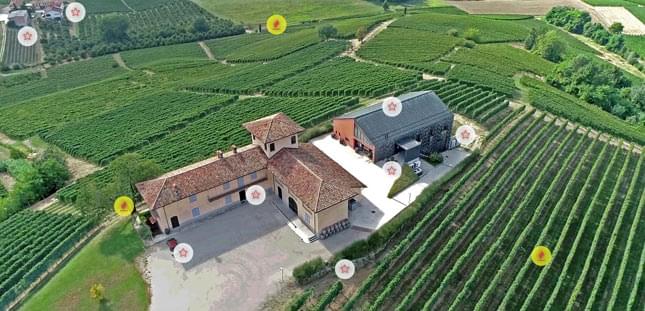 interctive-coverage-map-wineries-medium Aerial view of a winery estate surrounded by vineyard rows and agricultural landscape