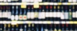a rack filled with different liquors